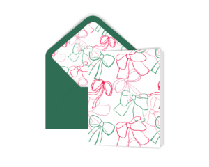 Illustrated Holiday Bows Greeting Card with pattern of illustrated bows in different sizes, shapes and shades of red and green. Green envelope is lined with same pattern.