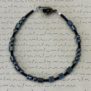 "Fuck Him" Morse Code Bracelet made with hematite and glass beads.