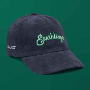 A blue corduroy hat with a design that says Earthlings.
