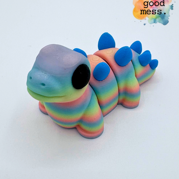 Stegosaurus Fidget Friend in Pastel Rainbow