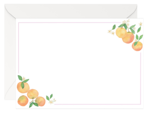 Photo of our Watercolor Clementine Notecard Stationery Set. The notecard features our watercolor clementines in two corners connected by a pastel lavender border. The notecard is on a white envelope.