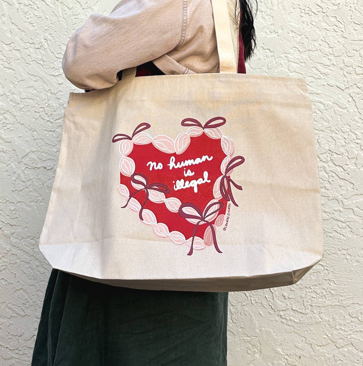 No Human Is Illegal Tote Bag (with Zipper Closure and Inside Pocket)