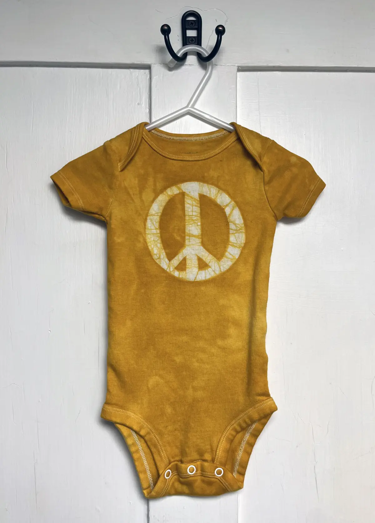 Peace sign baby bodysuit