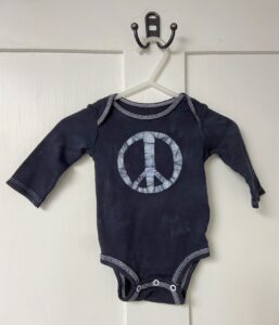 Long sleeve peace sign baby bodysuit