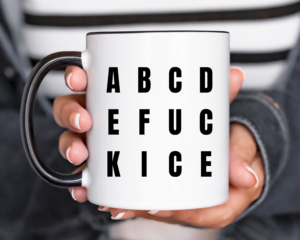 subtle fuck ice coffee mug in black and white reads ABCDE FUCK ICE