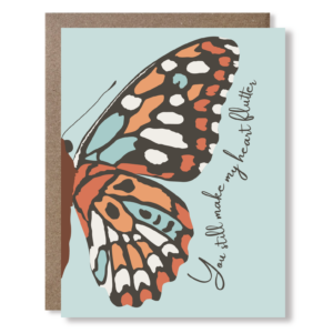 Greeting card featuring a large half butterfly illustration and text reading "You still make my heart flutter"
