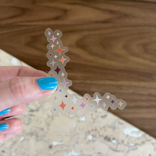 Purple, orange, & red sparkle corner sticker