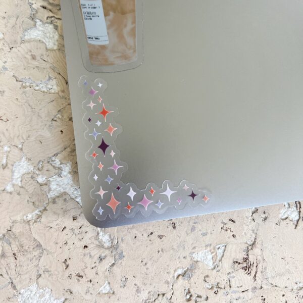 Purple, orange, & red sparkle corner sticker